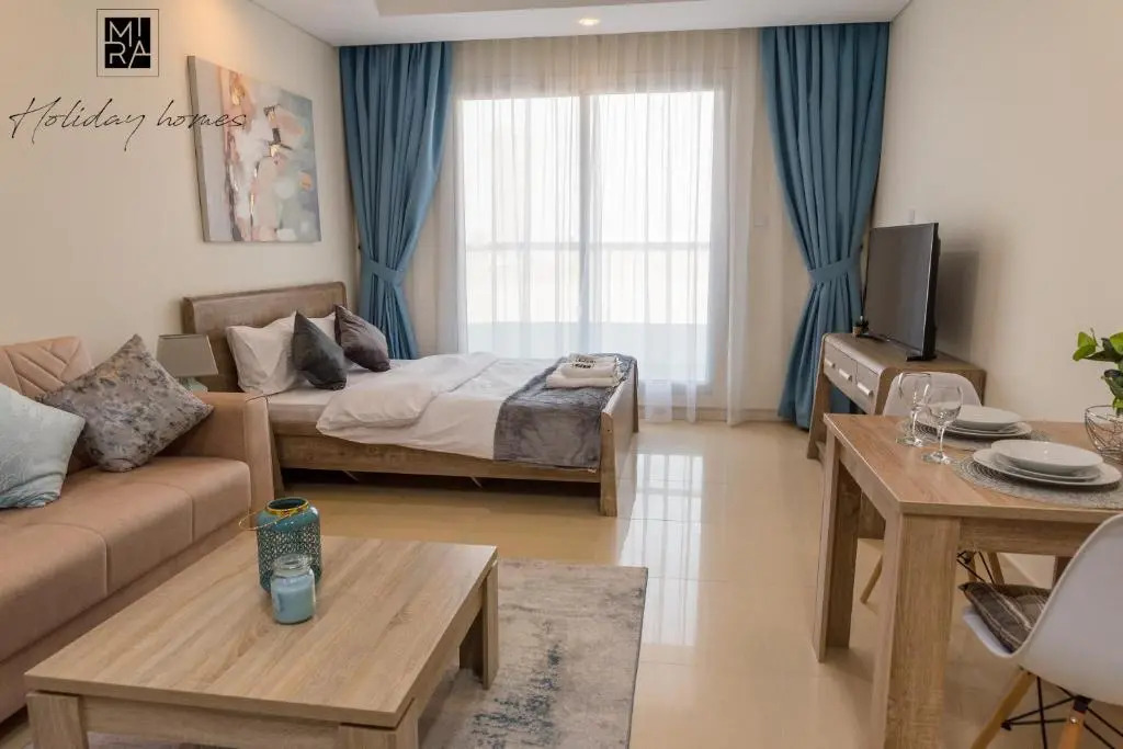 Mira Holiday Homes - Beautiful Studio - WIFI&Pool -7 min to Global Village