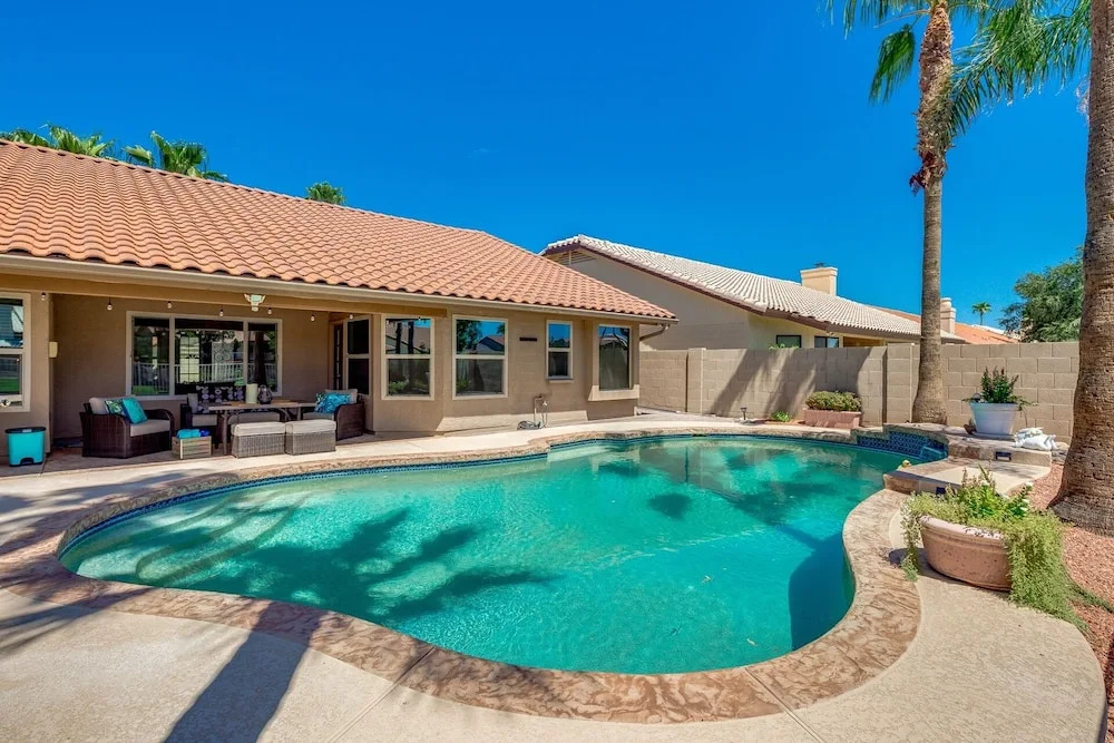 Updated waterfront home w/ private Heated pool & garage. Near Arrowhead shops! by RedAwning, Glendale