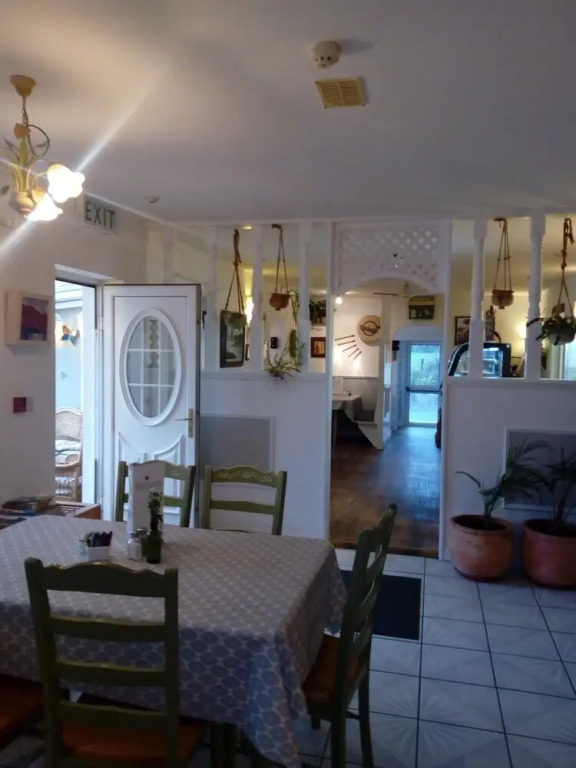 The Rose Garden Bed & Breakfast and Cafe