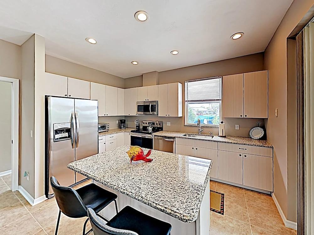 New Listing! Canal-side W/ Pool & Boat Dock 3 Bedroom Home