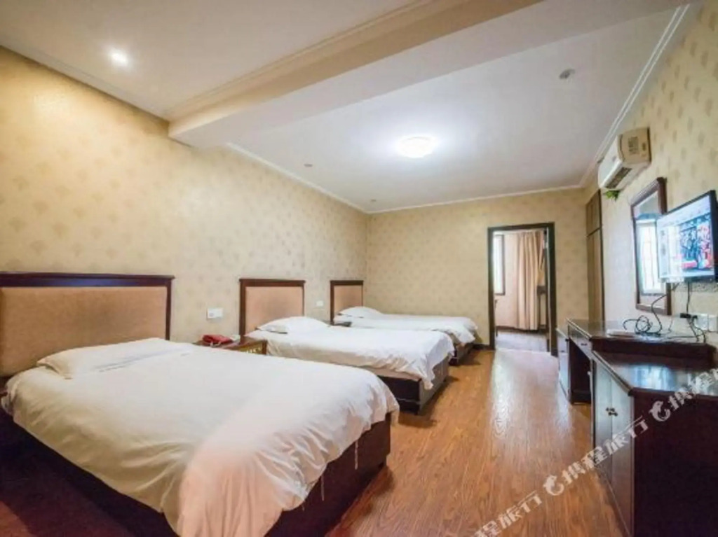Xihuan Business Hotel (Nantong Outer Ring West Road Open University)