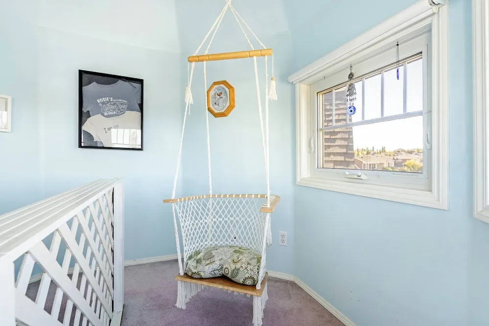 Charming Victorian Home in Okotoks Elegant Comfort & Modern Convenience