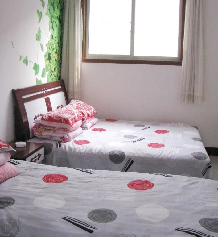 Rongjun Yujiale Hotel(蓬莱荣君渔家乐)