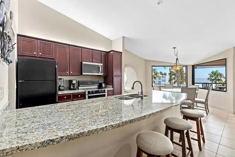 Quiet Bayfront Condo w/ Boat Slips & Fishing Pier!