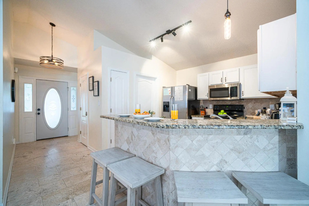 Pet friendly! Modern beach house with private heated pool-7 min walk to private beach access