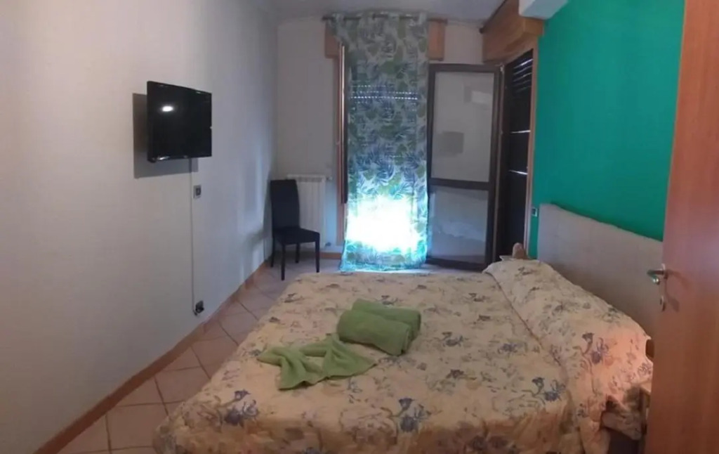Room in Guest Room - Camera Rosa Appartamento Quadrifoglio