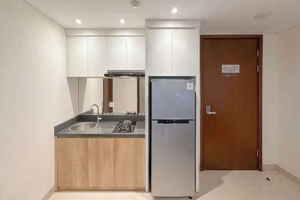 Cozy And Homey 2Br At Grand Sungkono Lagoon Apartment