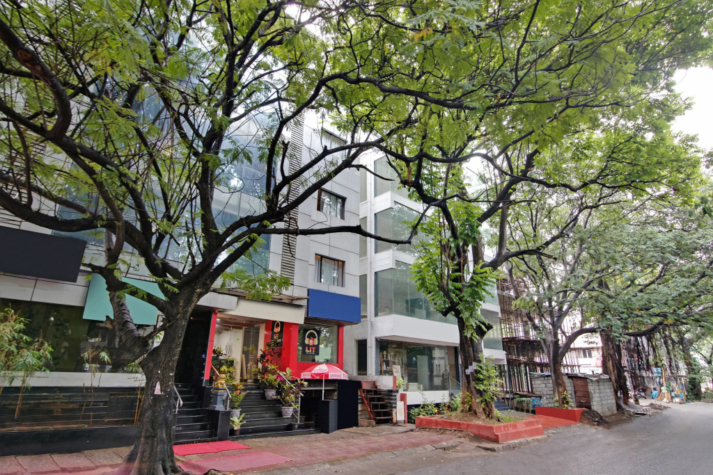 Capital O Elegant Amethyst Business Hotel Near Ragigudda Sri Prasanna Anjaneyaswamy Temple
