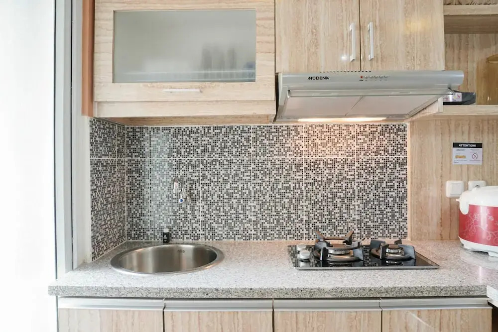 Homey and Fresh 2BR Green Pramuka Apartment