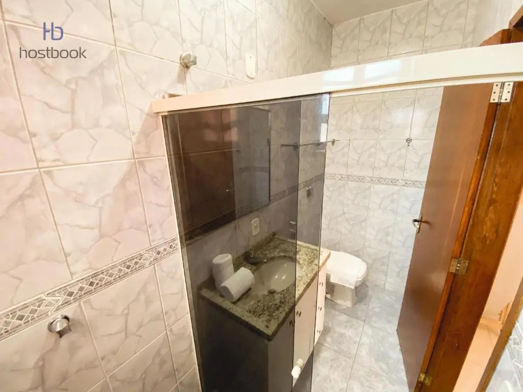 Casa a 400 m da praia do centro - WIFI 200MB - Garagem - TV 500 canais - 2 Quartos - Cozinha equipada - Churrasqueira