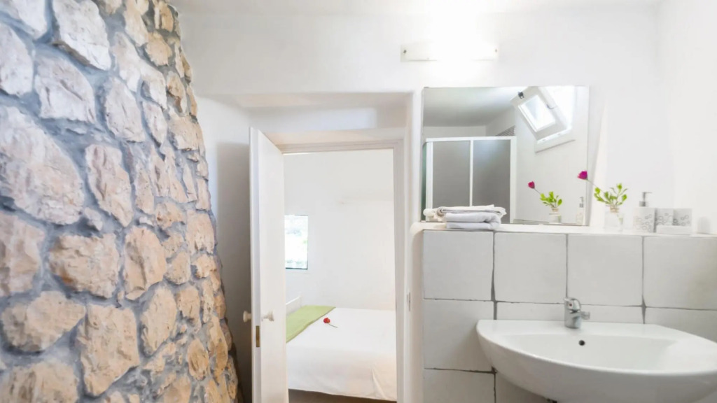 Typical property with swimming pool completely surrounded by secular olive trees and Mediterrean maq-VILLATRULLO MELOGRANO