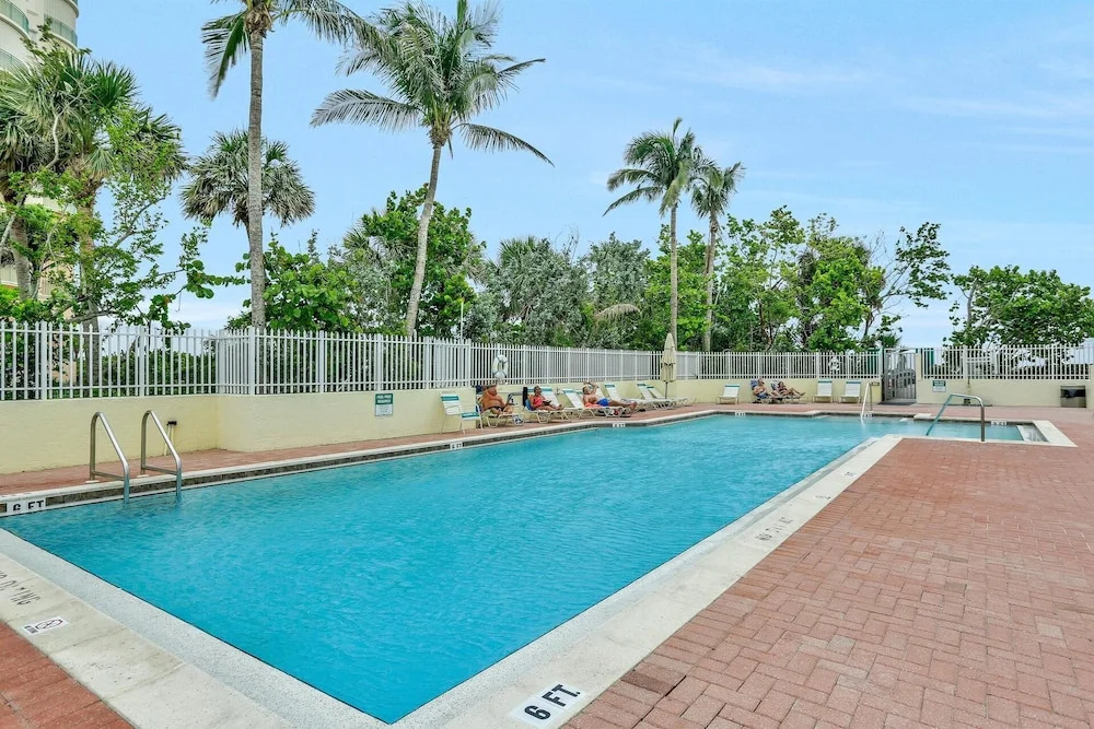 Unmatched Beachfront Condo With Roomy Balcony and Pool