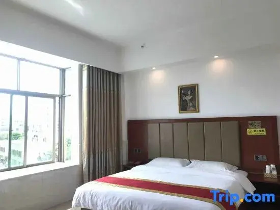 Wanning Jinle Business Hotel