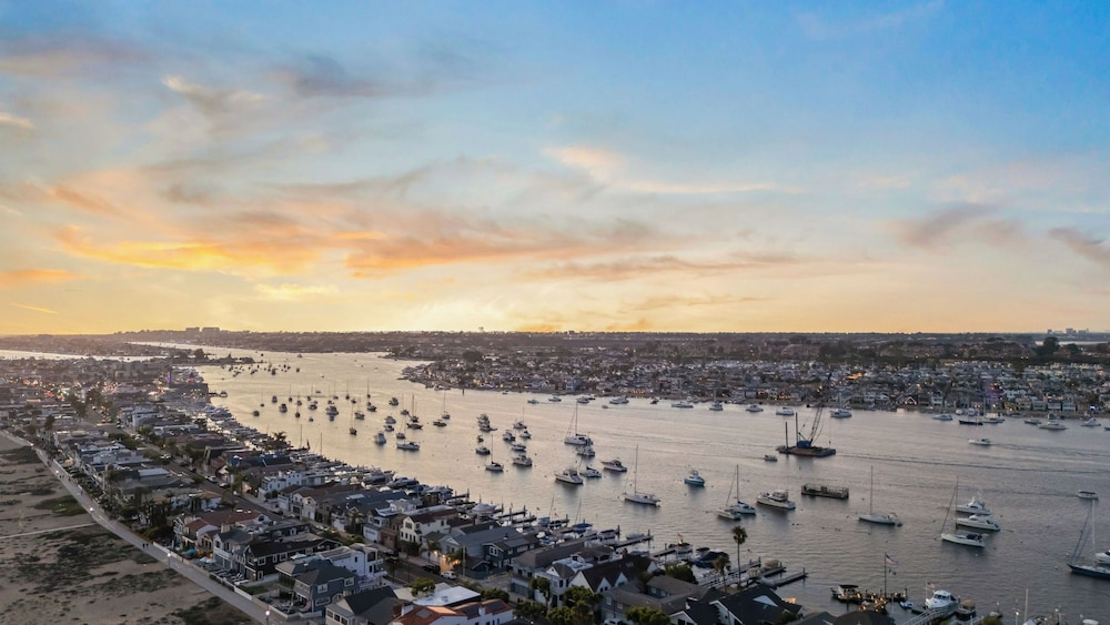 Oceanfront Home Walk to Balboa Pier + Scenic Views Balboa Peninsula Point by Avantstay