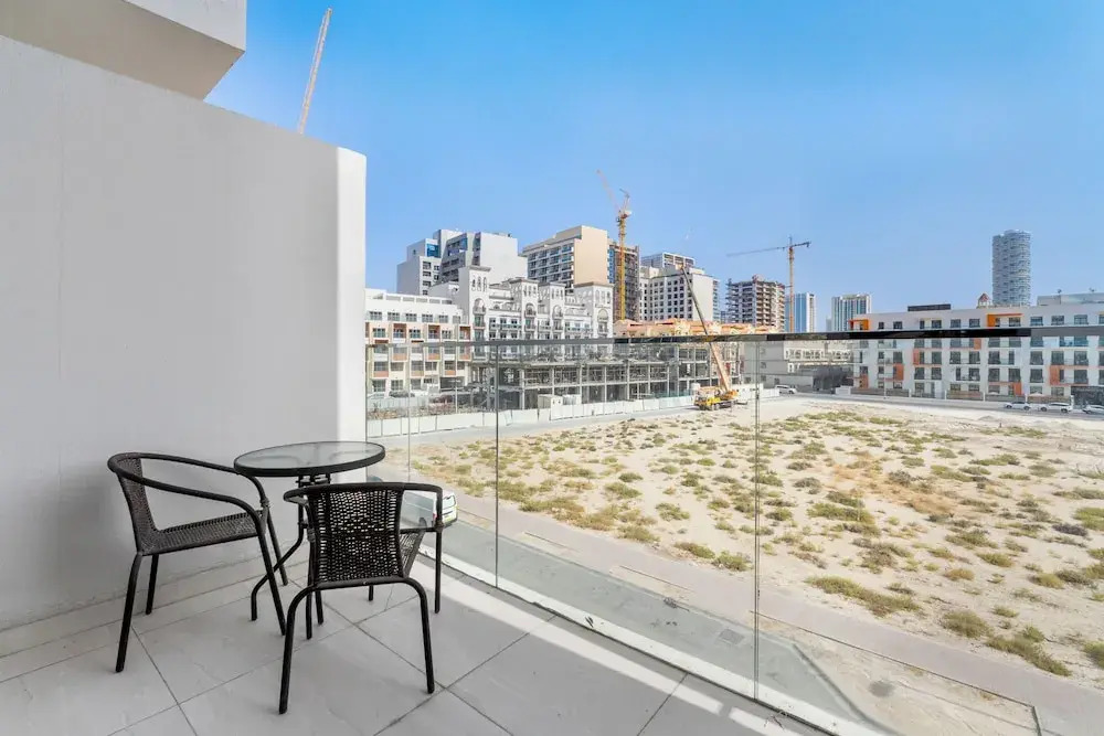 Waves - Stylish 1BR in JVC with Balcony & Pool
