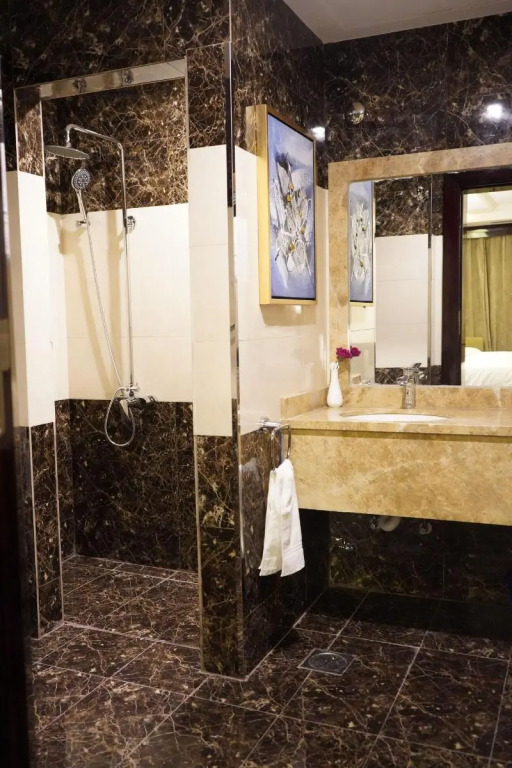 Al Ertiqaa Hotel