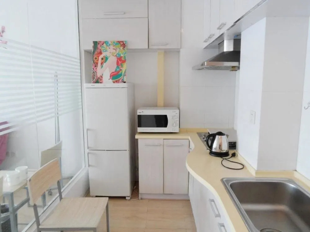 Dalian Jiujiuyuan Hotel Apartment