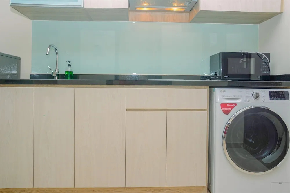 Fully Furnished and Comfortable Design Studio Menteng Park Apartment By Travelio