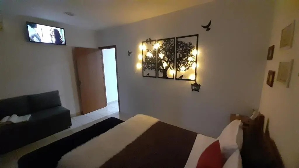 Suite climatizada, ao lado da praca principal