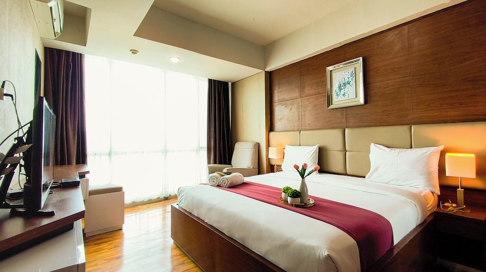 Modern 1Br With City View At Tamansari Papilio Apartment