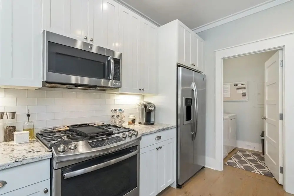 Golf Cart Screened-in Porch & Grill Station Close To Camp Watercolor 4 Bedroom Home by RedAwning
