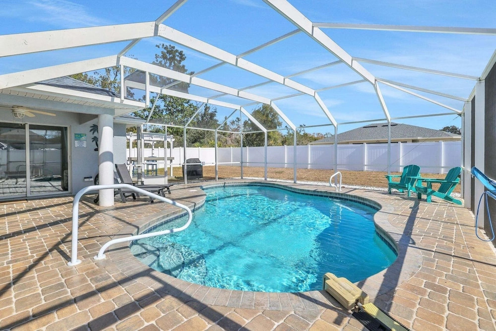 Contemporary Coastal Escape With Heated Pool, Fenced Yard, & Outdoor Dining