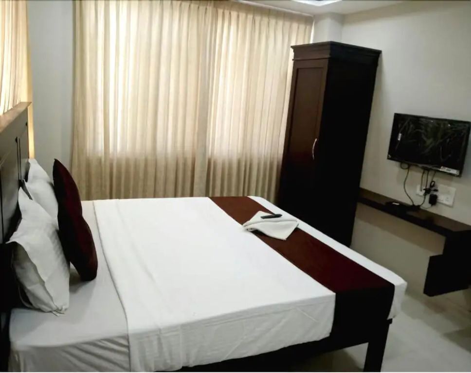 Rithikha Inn crest