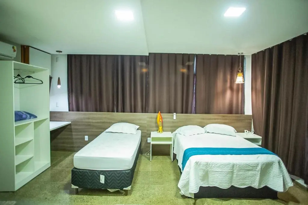 SEGUNDA CASA - Seu cantinho em Guarapari, 1 minuto a pé da Praia do Morro! Suítes confortáveis e modernas - Para casal ou para grupos de até 4 pessoas