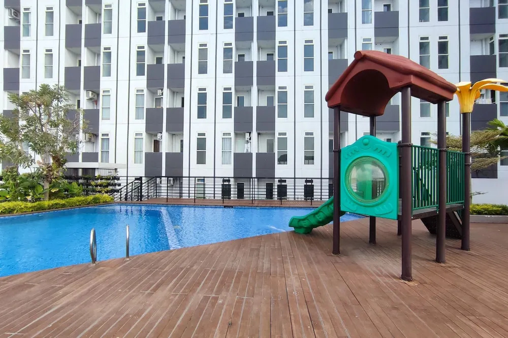 Homey 1BR without Living Room at Amartha View Apartment By Travelio