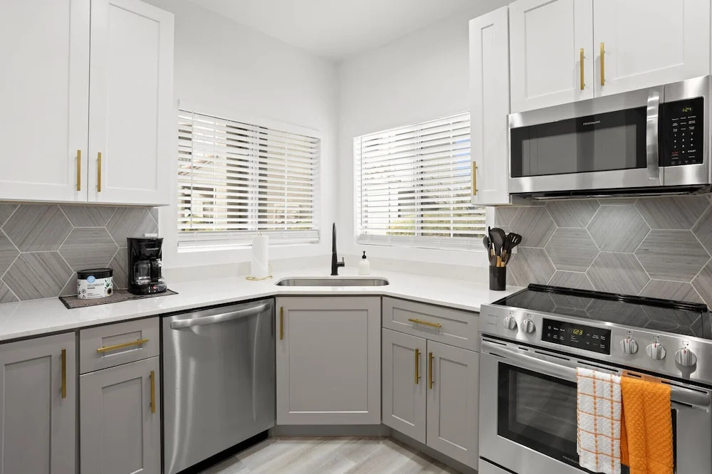 Two CozySuites TPC condos with parking and pool