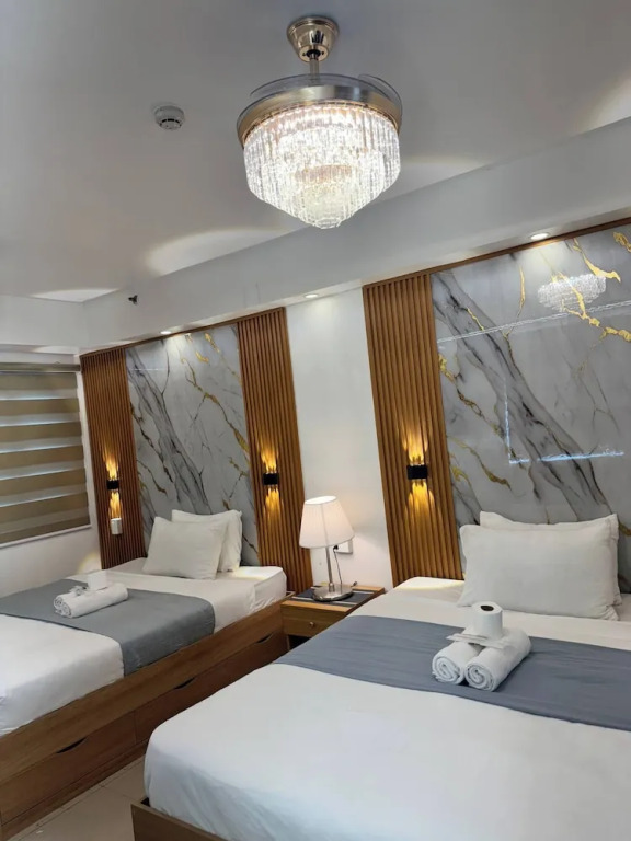 Relax in Pasay City's Best Kept Secret - Spacious Condo With Garden View
