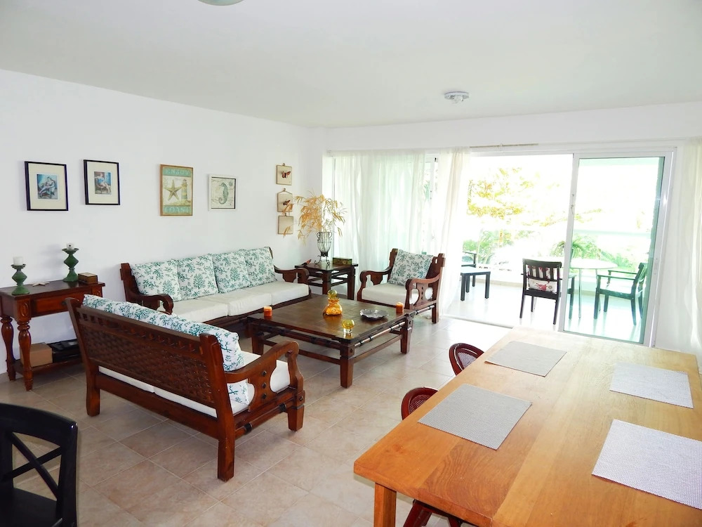 Sunny apartment at the beach with pool