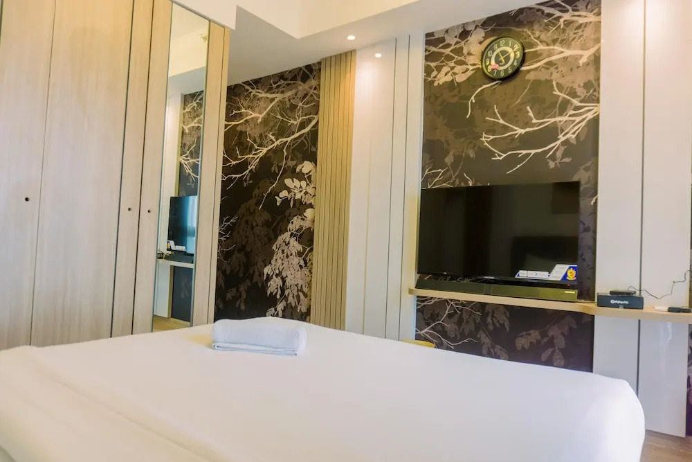 Spacious and Good Place 3BR Sky House BSD Apartment By Travelio