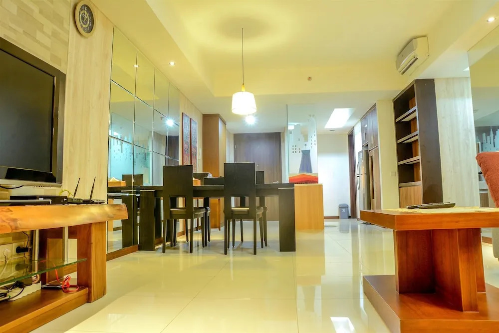 Cozy Pool View Kemang Village Residence Apartment with Direct Access To Mall