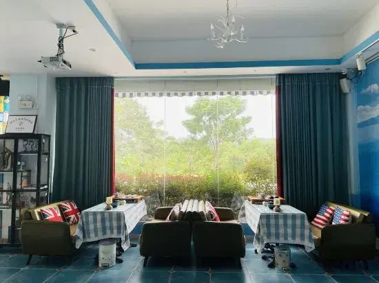 Jiuzhou Chain Theme Inn (Renhua Aiqinhai Fengqing Guanjing)
