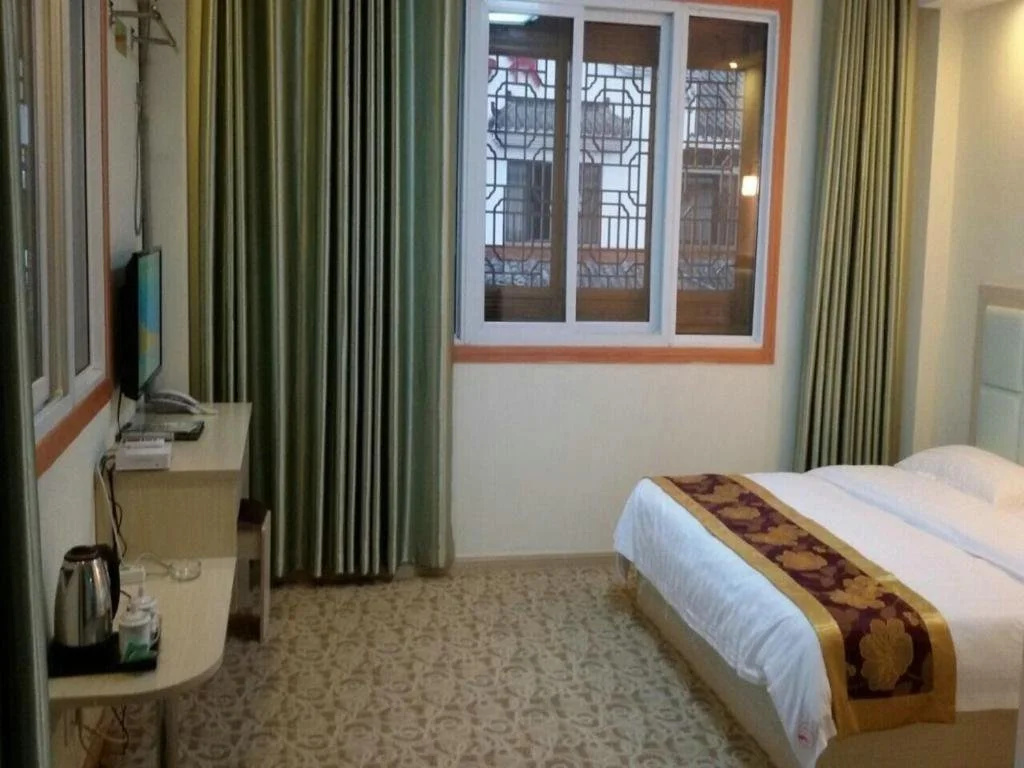 Chizhou Xiaocunzhilian Business Hotel