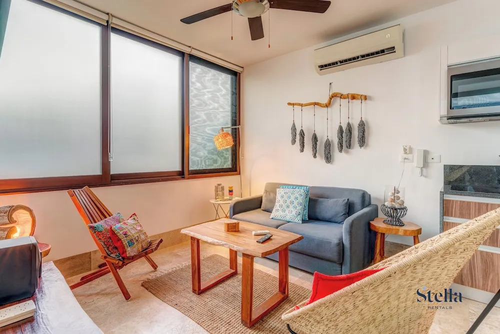 Private Rooftop 1BR Condo with Stunning Common Areas by Stella Rentals