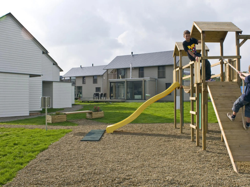 Child-friendly villa with stove, located in a lake area