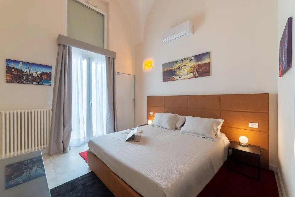 Y Arcillos Luxury Rooms CIN ITO75O35B4OOO468O2
