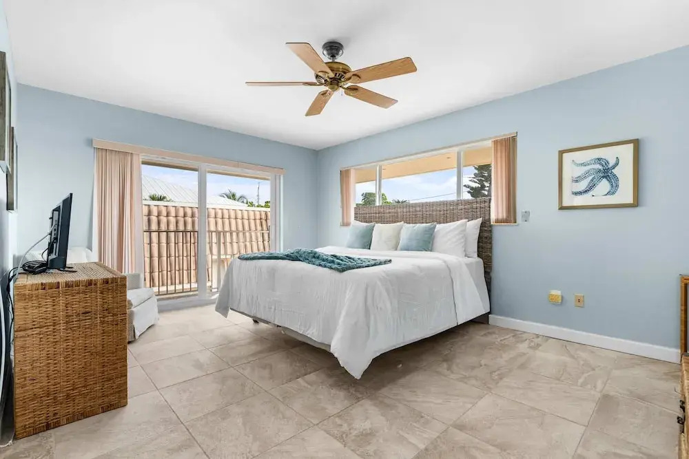 Sunset Harbor Waterfront Villa with Dock Cabana Club