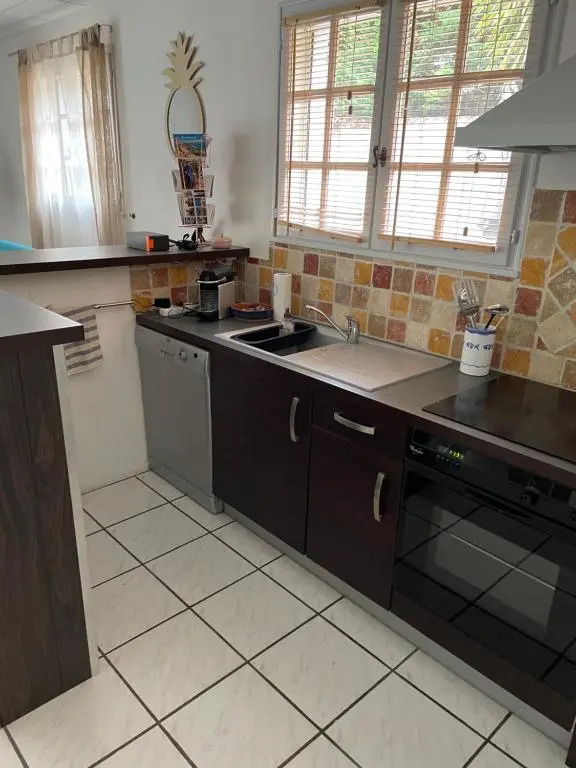 Appart. bas de villa de 50m2 avec parking privatif