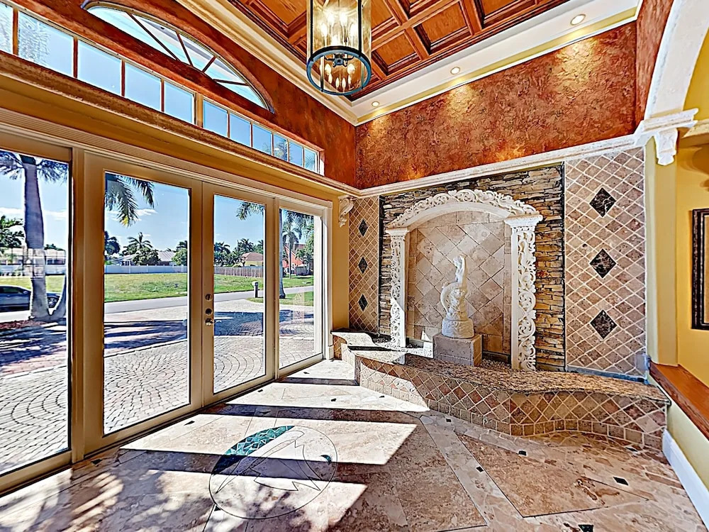 New Listing! European-style On Canal W/ Pool 4 Bedroom Home