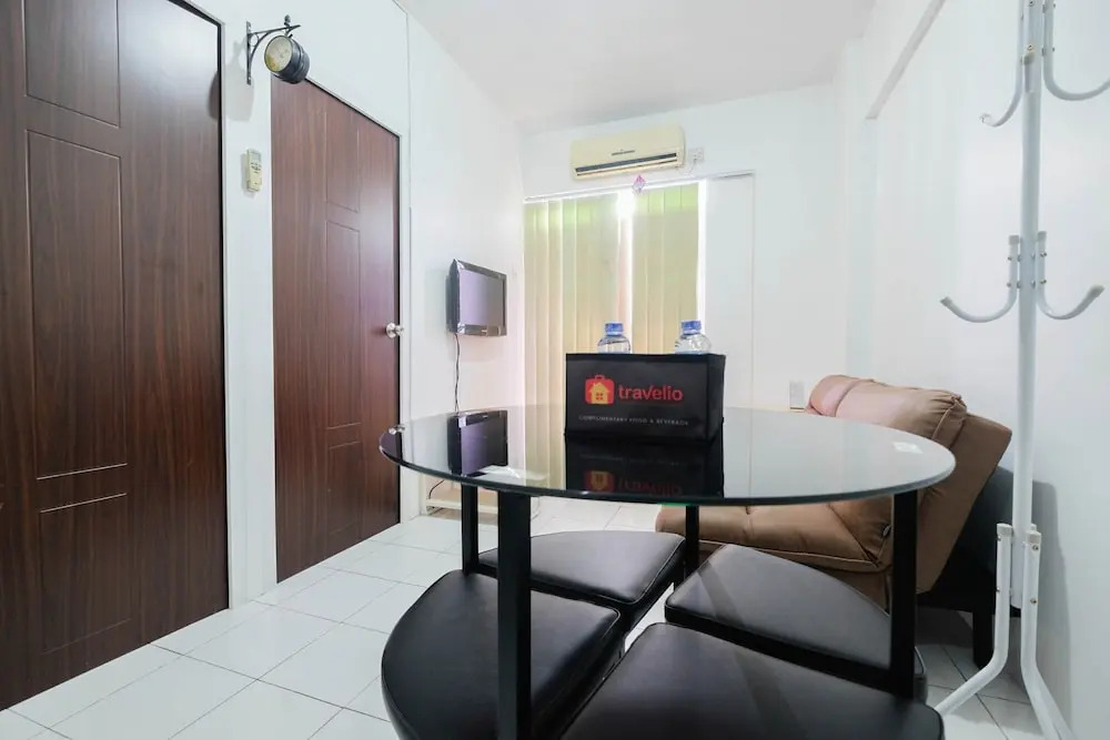 New Furnished 2BR at Mutiara Bekasi Apartment By Travelio