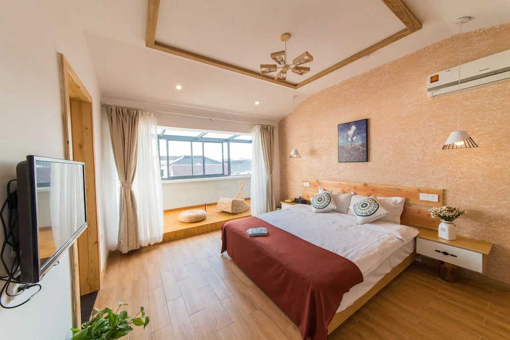 Wuzhen woxingwosu Hotel