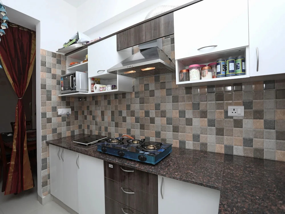 OYO 13172 Home Exotic 1BHK Pacific Golf Estate