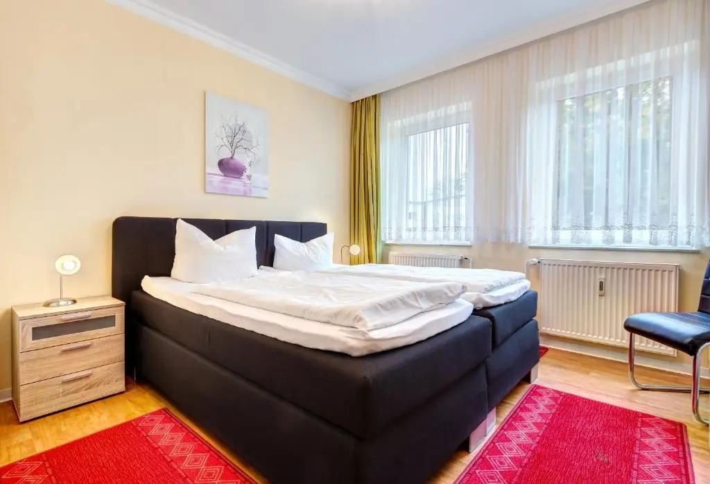 Am Schloonsee Haus D - Apartments mit Strandkorb