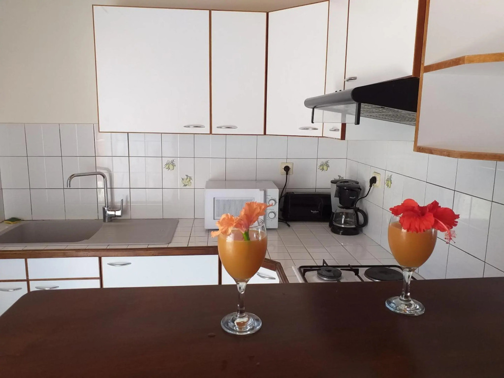 Appartement de 2 chambres avec piscine partagee jardin clos et wifi a Sainte Anne a 3 km de la plage