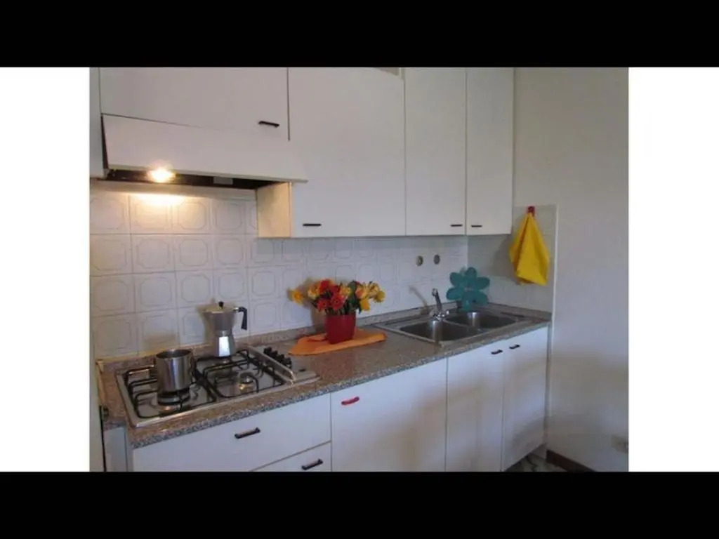 Beachfront Condo Lido dei Pini - Airco - Private Parking - Beach Place