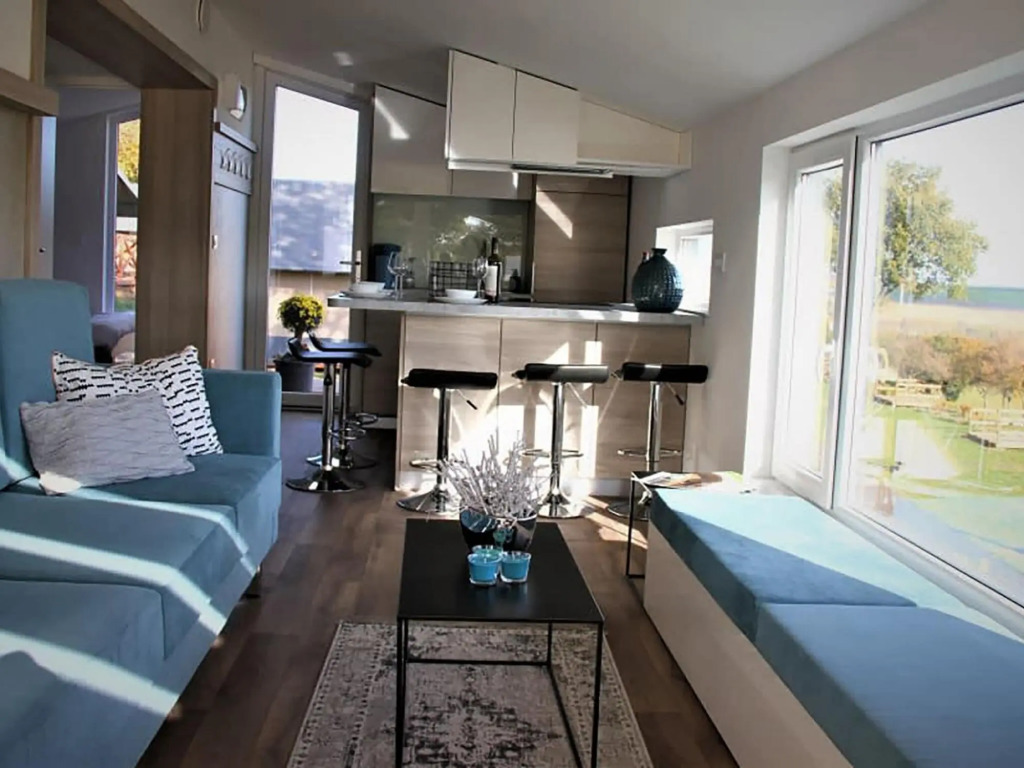 Comfortable chalet with cooking island, in a holiday park on the Gulperberg