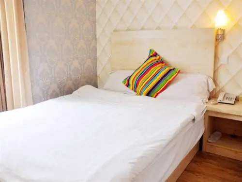 Qingdao Four Seasons Sunshine Business Hotel